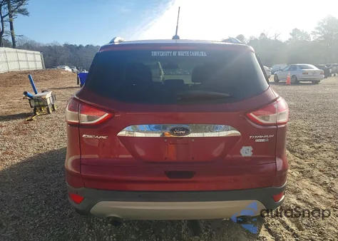 2016 Ford Escape Titanium z USA, uszkodzony, nr VIN 1FMCU9J94GUC83133